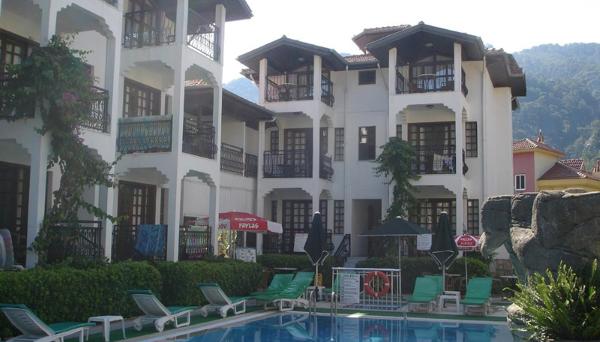 Turgay Apart