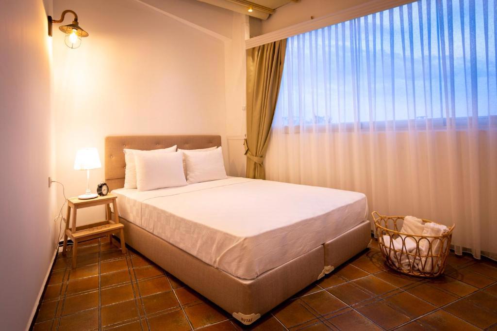 Guzi Rooms & Suites