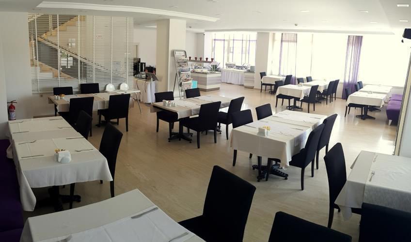 Kamer Suites & Hotel