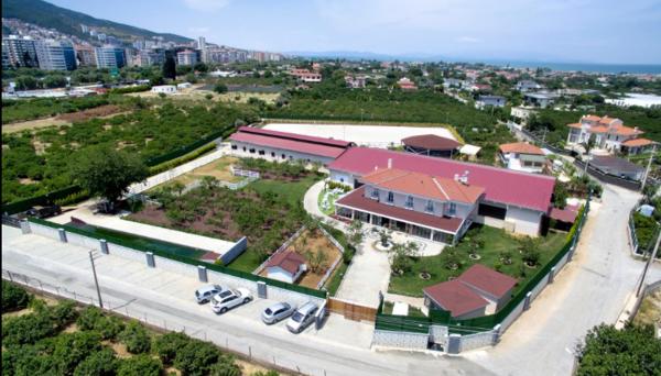 B. Equine Range Hotel