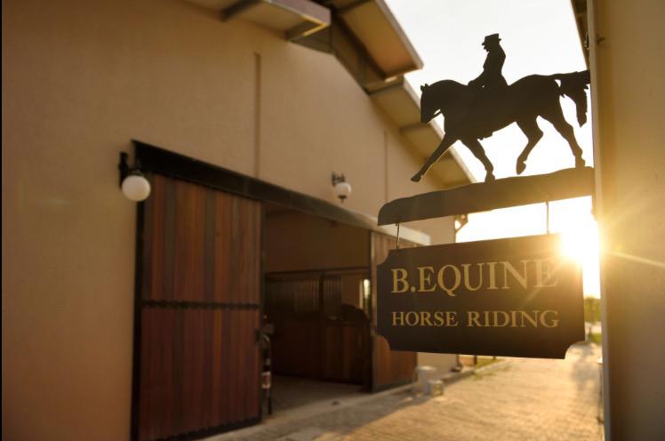 B. Equine Range Hotel