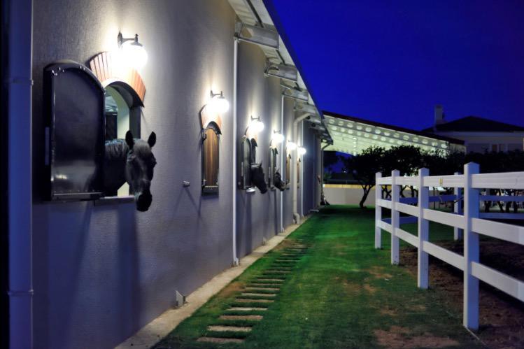 B. Equine Range Hotel